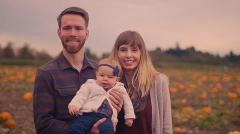 Portrait of a family at a pumpkin patch Stock Footage 58597113