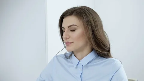 Portrait of a fashionable young professional woman in a contemporary office. Stock Footage