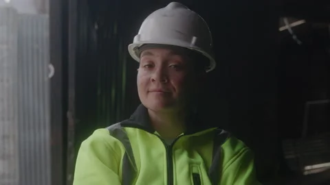 Portrait of a Female Blue Collar Worker in a Hard Hat Stock Footage 222008248
