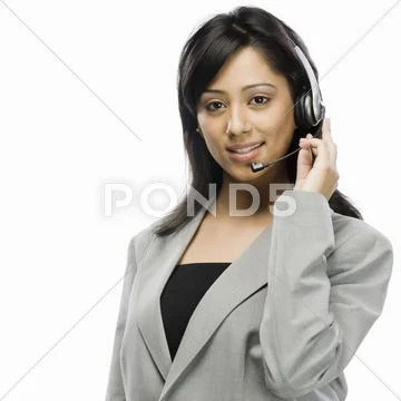 Portrait of a female customer service representative smiling Stock Photos
