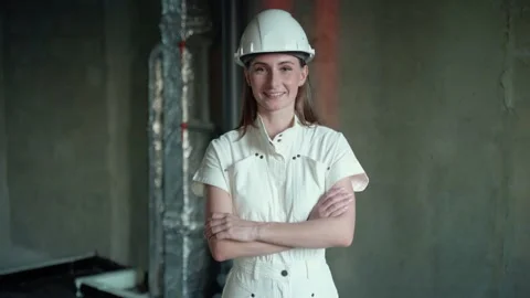 Portrait of a female engineer on a construction site looking into the camera. A 스톡 동영상 254768080