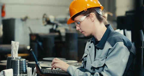 Portrait of female engineer using CAD programming software on laptop Stock Footage 171149847