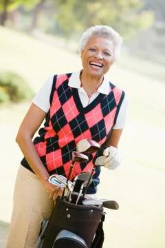 Portrait of a female golfer Stock Photos