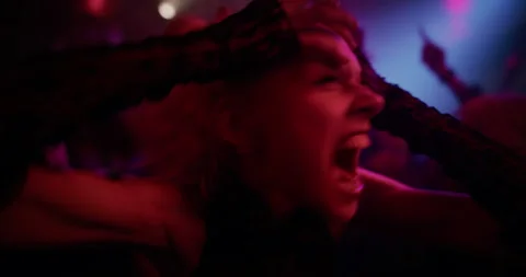 Portrait Female Having Crazy Good Time at a Rave Party Stock Footage 320700697
