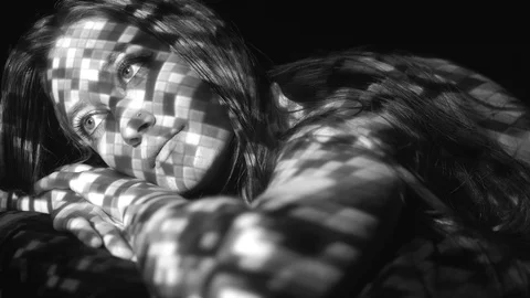 Portrait of female model with projected disco ball pattern. Black and white. Stock Footage 89632241