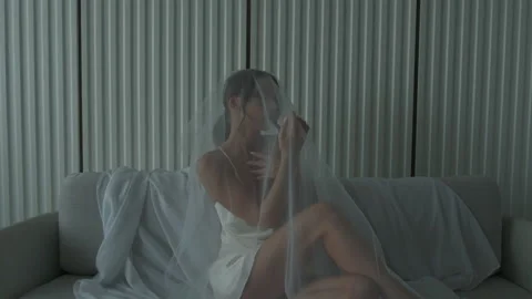 Portrait female posing and looking seductively at camera Vidéo 219630073
