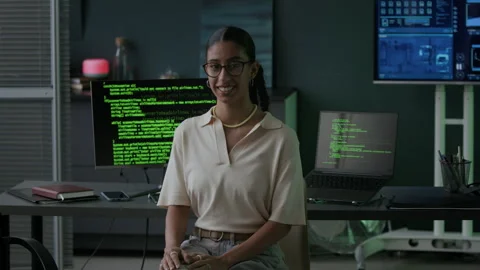 Portrait of Female Programmer in Office with Running Program Codes on Screens Stock Footage 292622845