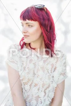 Portrait Of Feminine Young Woman With Pink Hair