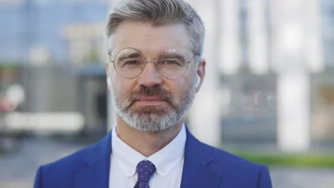 Portrait Of Focused Businessman Looking In the Camera Wearing Glasses. Closeup Stock Footage 250971998