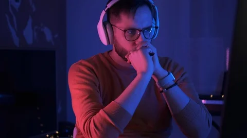 Portrait of a focused freelancer student. Handsome man working at home Stock Footage 126582485