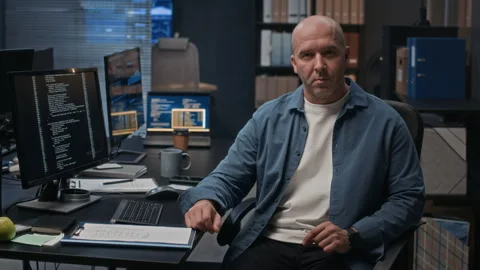 Portrait of Focused Male Software Developer at Computer in Modern Office Stock Footage 324033989