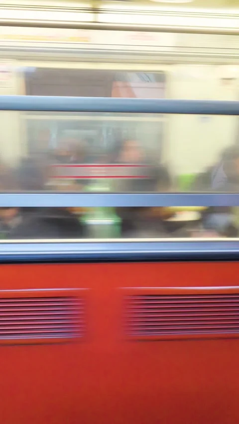 Portrait format video of subway train reaching Mexico City platform with doors Stock Footage 319012045