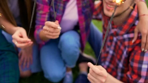 Portrait of four happy hipsters while they making selfie with sparklers  Stock Footage 75765122