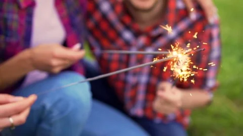 Portrait of four happy hipsters while they making selfie with sparklers Stock Footage 75765249