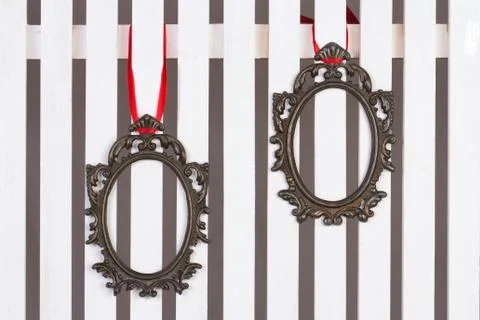Portrait frames hanging on the wall Stock Photos
