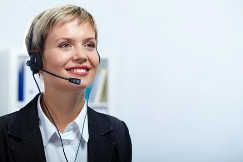 Portrait of friendly customer service representative during work Stock Photos