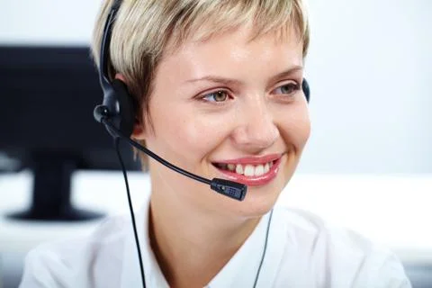 Portrait of friendly customer service representative smiling 스톡 사진