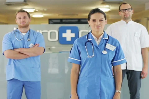 Portrait of friendly doctors looking at camera and smiling Stock-Footage 34660864