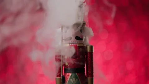 Portrait in front of a lively bokeh studio background, the Toy Nutcracker Stock Footage 321679325