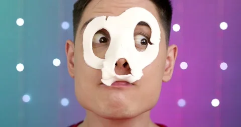 Portrait of a funny man in a mask. Stock Footage 160533247
