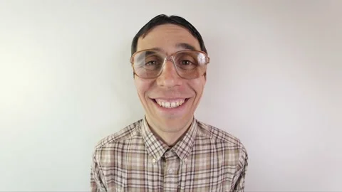 Portrait of funny nerd in glasses Stock Footage 131179353