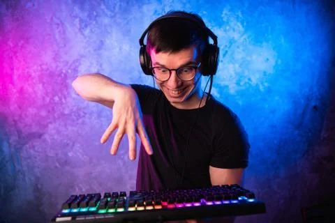 Portrait of funny nerd working on computer Stock Photos