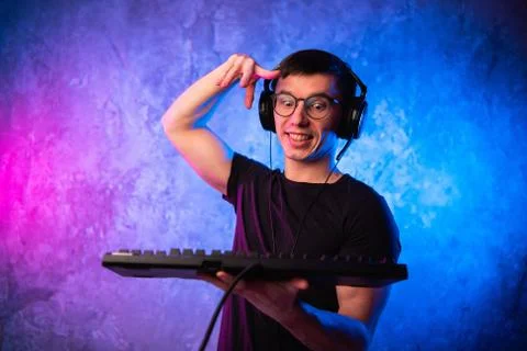 Portrait of funny nerd working on computer Foto stock