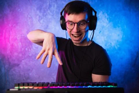 Portrait of funny nerd working on computer Foto stock