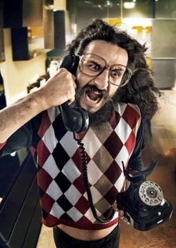 Portrait of a funny yelling guy Stock Photos