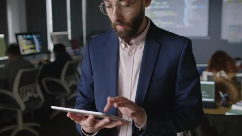 Portrait of Geeky Young Male Programming Teacher with Tablet at Work in College Stock Footage 278126052