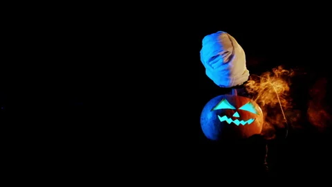Portrait of a ghost covered with white fabric ribbons in neon light. Stock Footage 285583050