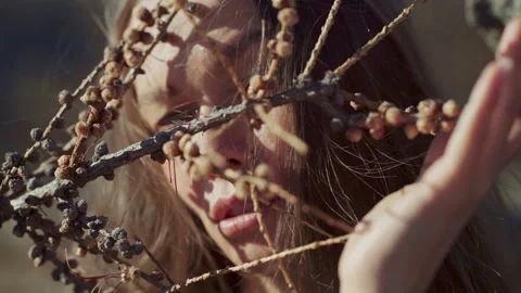 Portrait of a girl with elements of tree branches shot close-up Stock-Footage 141219163