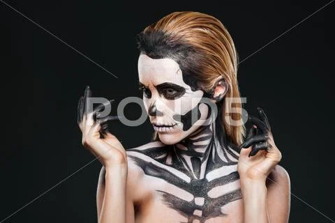 Portrait of girl with fearful halloween makeup Stock Photos