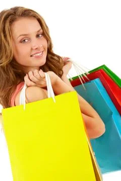 Portrait of a girl with handbags looking at camera and smiling Stock Photos