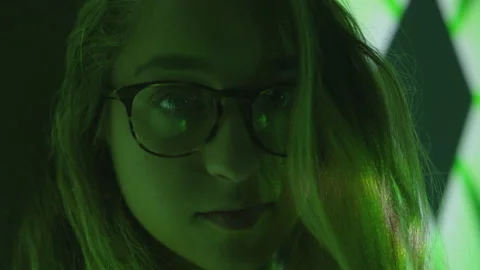 Portrait of Girl with Neon Projected Lights on Face Stock Footage 208709853