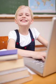Portrait of a girl using a notebook Stock Photos