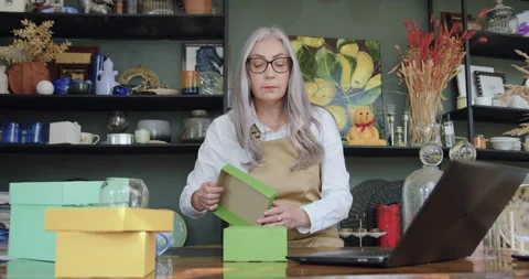 Portrait of good-looking confident hardworking senior woman in glasses which Stock Footage 144001463