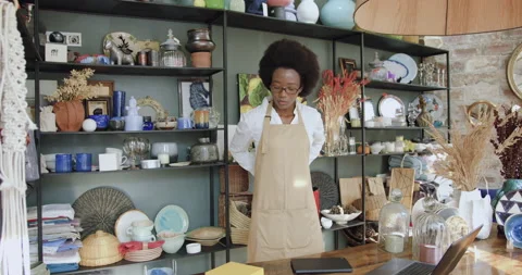 Portrait of good-looking confident young black-skinned woman which dressing Stock Footage 143955554