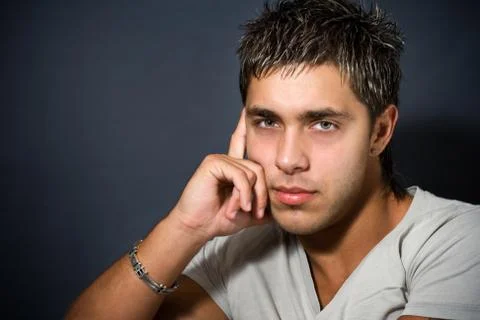 Portrait of good looking guy Stock Photos