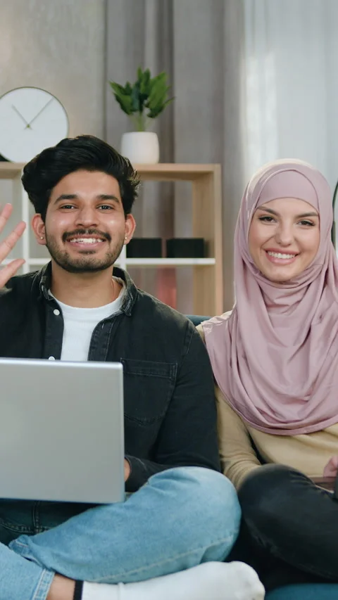 Portrait of good-looking in high spirits carefree young arabian couple of bearde Stock Footage 328184858