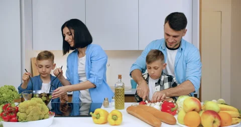 Portrait of good-looking joyful contented family with children which having fun Stock Footage 139340669