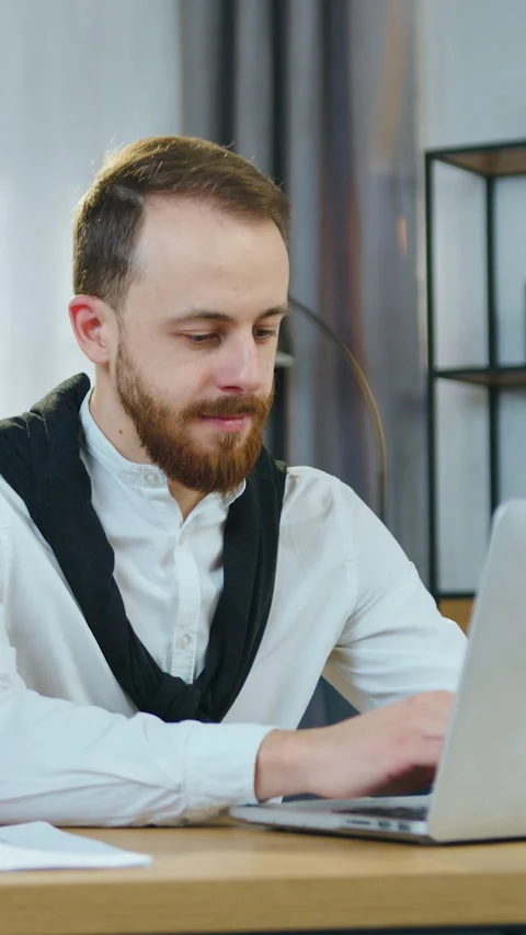 Portrait of good-looking positive skilled 30-aged guy with well-maintained beard Stock Footage 330253828