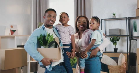 Portrait of good-looking smiling friendly loving african american family with Stock Footage 150642814