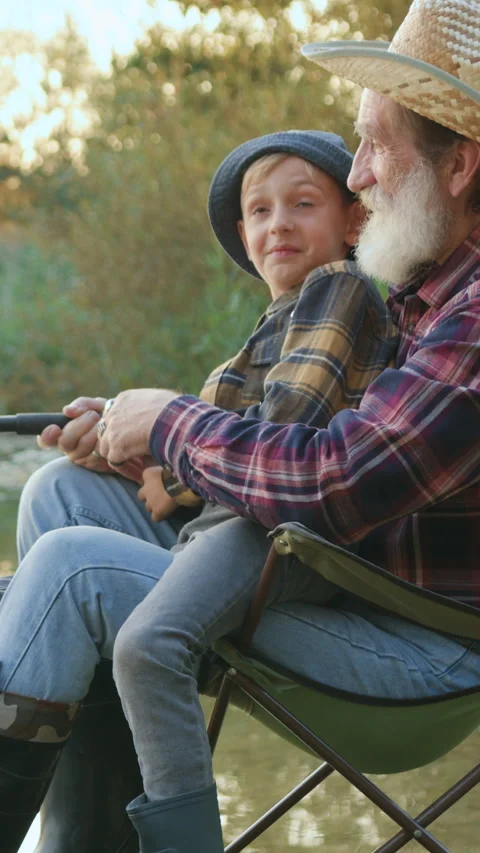 Portrait of good-tempered cheerful old grandfather with grey beard in straw hat  Stock Footage 329182553