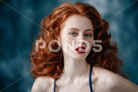 A portrait of a gorgeous beautiful young woman posing in the studio. Beauty, Stock Photos