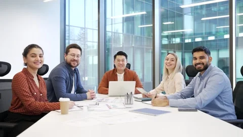 Portrait of group multiethnic business team sitting in modern office boardroom  Stock Footage 301973953