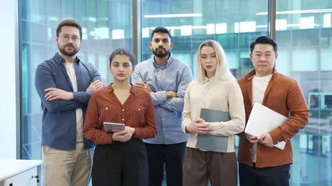 Portrait of group serious multiethnic team standing in modern office. Stock Footage 319070161