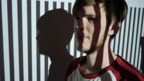 The portrait of the guy in the background of the projector Stock Footage 130817411