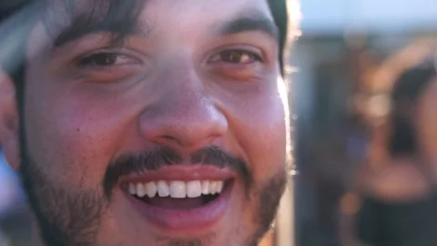 Portrait of a Guy Smiling in a Pool Party Stock Footage 86566131