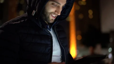 Portrait of a Guy using tablet at night Stock Footage 89729649